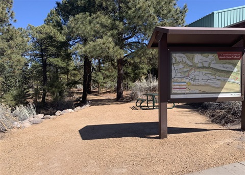 Kinnikinnik Park ADA Trail Image showing the entrance to the trail at the Aquatic Center Trailhead