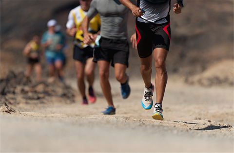 People running on a dirt path.png