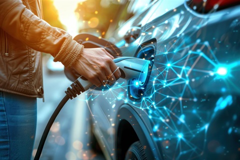 Electric Car Stock Image showing a person plugging in their car with an overlay of the electric grid