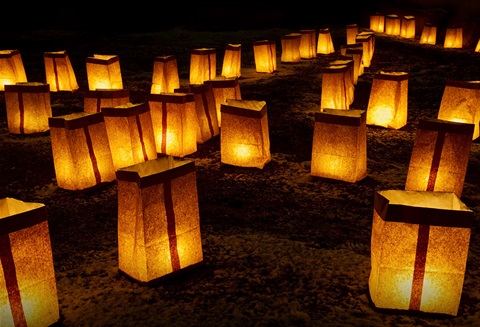 Farolitos lined up and lit