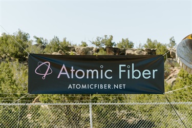 Banner that reads Atomic Fiber atomicfiber.net
