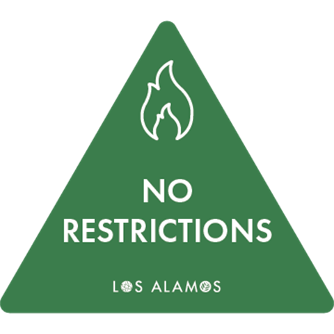 Green triangle with illustrated flame and text that reads 