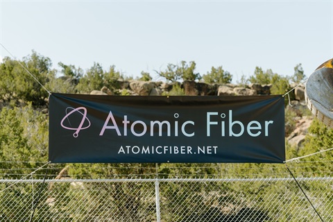 Banner that reads Atomic Fiber atomicfiber.net
