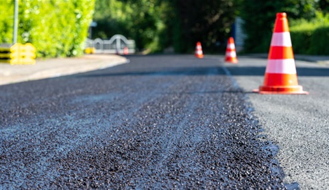 Roadway Seal Treatment showing cones dividing the roadway
