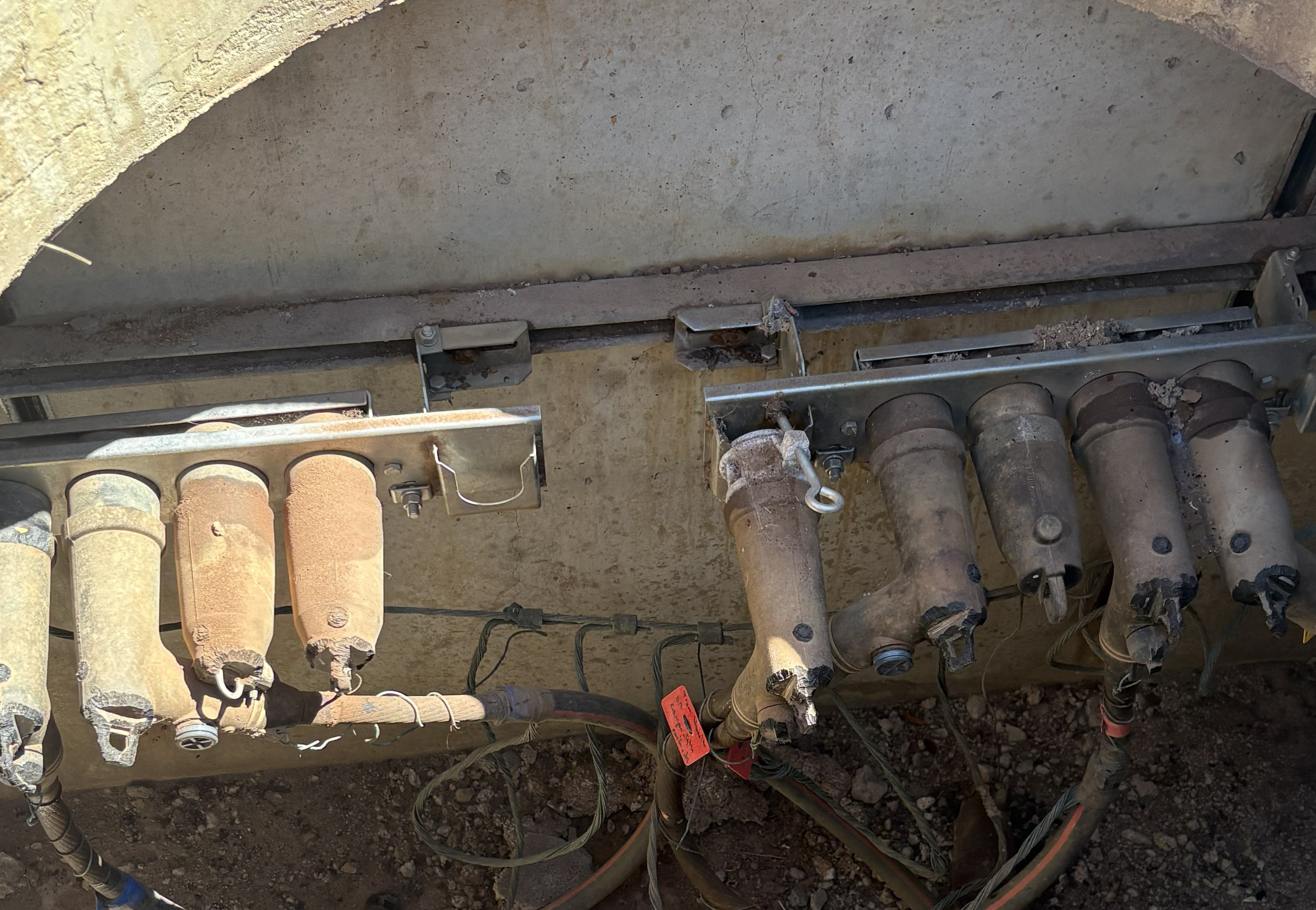 chewed electrical elbow plugs in a manhole