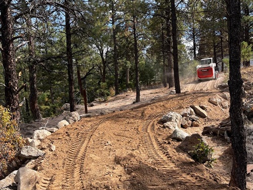 Kinnikinnik Park ADA Trail Image showing staff grading the new trail
